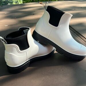 UGG white rubber ankle boots.